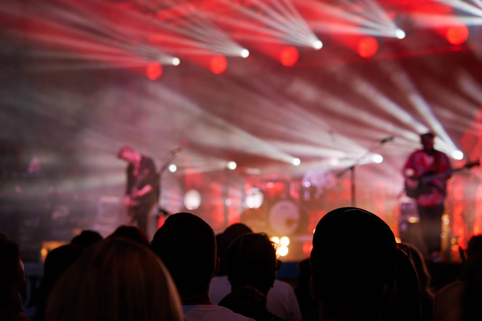 crowd-of-people-enjoying-concert-before-stage